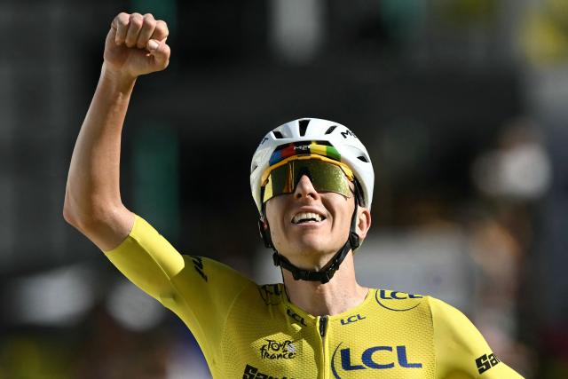 UAE Team Emirates - XRG's Slovenian rider Tadej Pogacar cycles to the finish line to win the 19th stage of the 113th edition of the Tour de France cycling race, 127,9 km between Gap and Alpe d'Huez in the French Alps, on July 24, 2026. (Photo by Jeff PACHOUD / AFP)
