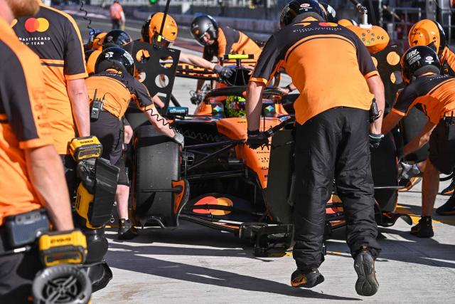 The car of Mercedes' British driver George Russell is moved by mechanics during the second practice of Formula One Hungarian Grand Prix at the Hungaroring circuit in Mogyorod near Budapest, Hungary, on July 24, 2026. (Photo by Attila KISBENEDEK / AFP)