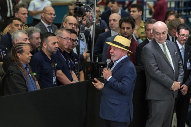 Brazil's President Luiz Inacio Lula da Silva delivers a speech during a visit to the headquarters of Brazilian defense and aerospace company Avibras Aeroco, in Jacarei, some 90 km from Sao Paulo, Brazil, on July 24, 2026. (Photo by Nelson ALMEIDA / AFP)