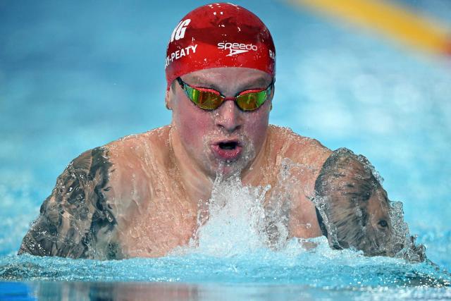 England's Adam Ramsay-Peaty competes in the Men's 100m Breaststroke Semi-Final during the swimming event at the Tollcross International Swimming Centre in Glasgow, on day one of the Commonwealth Games in Glasgow, Scotland, on July 24, 2026. (Photo by Oli SCARFF / AFP)