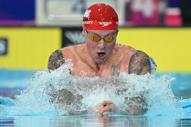 England's Adam Ramsay-Peaty competes in the Men's 100m Breaststroke Semi-Final during the swimming event at the Tollcross International Swimming Centre in Glasgow, on day one of the Commonwealth Games in Glasgow, Scotland, on July 24, 2026. (Photo by Oli SCARFF / AFP)