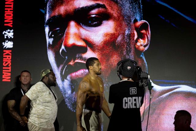 Britain's boxer Anthony Joshua arrives for the weigh-in ceremony on the eve of his fight against Albania's boxer Kristian Prenga in their heavyweight bout, in Jeddah on July 24, 2026. Briton Anthony Joshua, a two-time heavyweight champion, will face Kristian Prenga at "The Comeback" event in Saudi Arabia on July 25. (Photo by AFP)