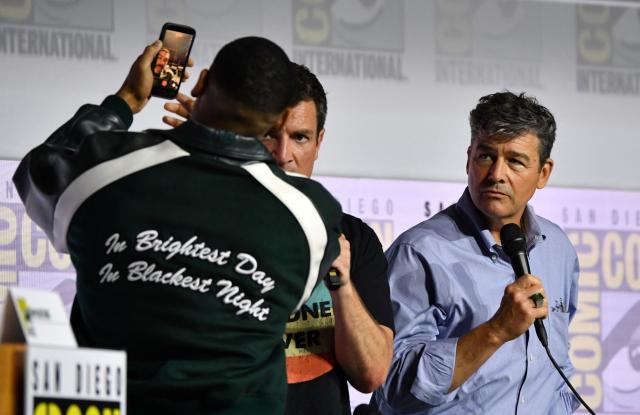 (L/R) British actor Aaron Pierre, US actor Kyle Chandler and Canadian-US actor Nathan Fillion take a selfie as they attend HBO’s “Lanterns” panel during Comic Con International in San Diego on July 24, 2026. (Photo by Chris DELMAS / AFP)