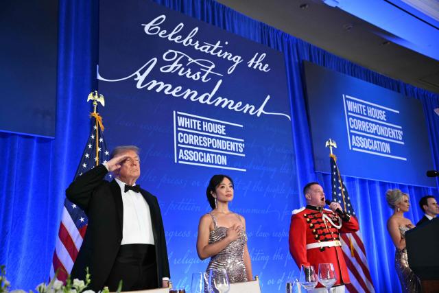 US President Donald Trump salutes during the 2026 White House Correspondents' Association (WHCA) Dinner at the Waldorf Astoria in Washington, DC, on July 24, 2026. The 2026 WHCA Dinner was originally scheduled for April 25 at the Washington Hilton, but was rescheduled and relocated after an alleged gunman breached security. (Photo by Mandel NGAN / AFP)