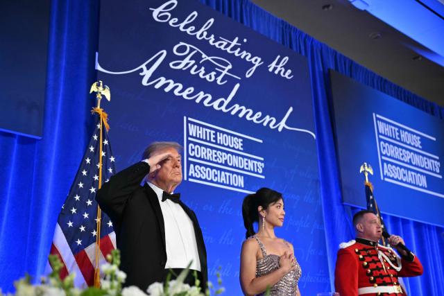 US President Donald Trump salutes during the 2026 White House Correspondents' Association (WHCA) Dinner at the Waldorf Astoria in Washington, DC, on July 24, 2026. The 2026 WHCA Dinner was originally scheduled for April 25 at the Washington Hilton, but was rescheduled and relocated after an alleged gunman breached security. (Photo by Mandel NGAN / AFP)