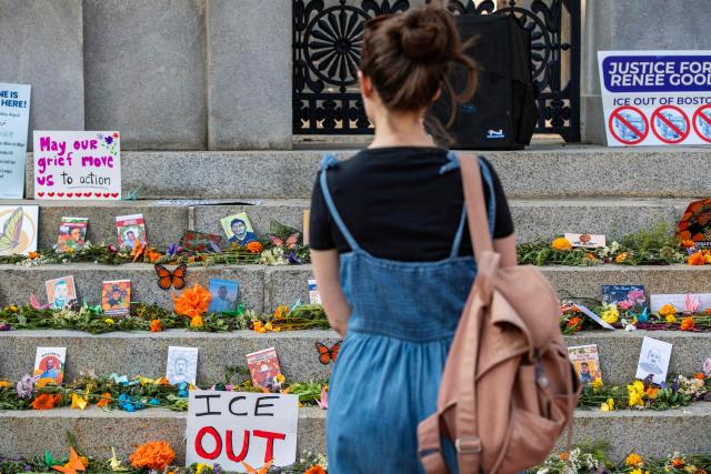 People view a memorial honoring people who have been killed during US Immigration and Customs Enforcement (ICE) operations on the steps of the State House during a 24-hour vigil in Boston, on July 24, 2026. (Photo by JOSEPH PREZIOSO / AFP)