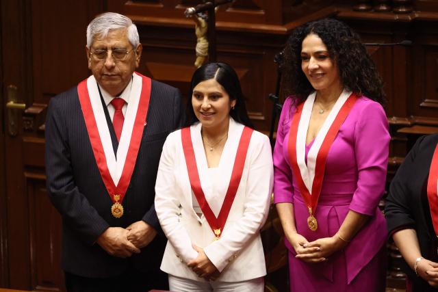 Luis Quispe elected deputy of the Buen Gobierno party, Yenifer Noelia Paredes elected deputy of the Juntos por el Peru party, and Cecilia Chacon elected deputy of the Fuerza Popular party, attend their swearing-in ceremony at Peru's Congress in Lima on July 24, 2026. (Photo by Connie FRANCE / AFP)