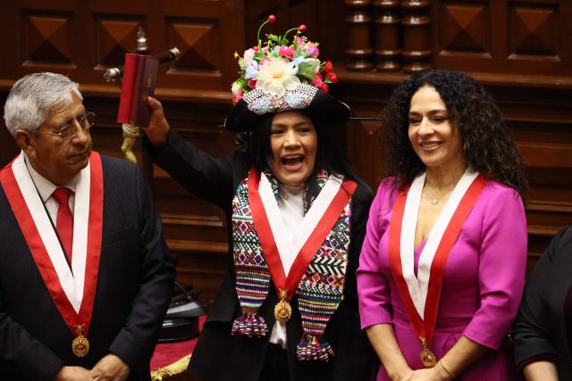 Luis Quispe elected deputy of the Buen Gobierno party, Catherin Palomino elected deputy of the Juntos por el Peru party, and Cecilia Chacon elected deputy of the Fuerza Popular party, attend their swearing-in ceremony at Peru's Congress in Lima on July 24, 2026. (Photo by Connie FRANCE / AFP)