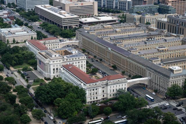 The US Department of Agriculture Administration building, named after Jamie L. Whitten, is seen along with the USDA South building from the observation deck of the Washington Monument in Washington, DC on July 24, 2026. (Photo by Kent Nishimura / AFP)