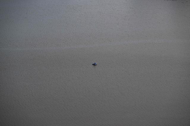 Paddleboarders in the middle of the tidal basin, just off of the Jefferson Memorial, are seen from the observation deck of the Washington Monument in Washington, DC on July 24, 2026. (Photo by Kent Nishimura / AFP)