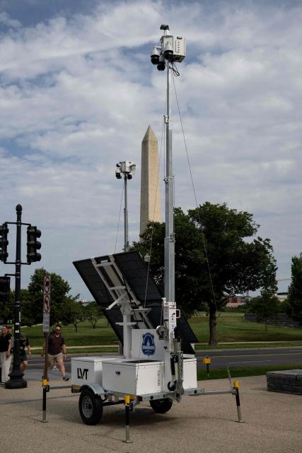 Multiple mobile surveillance trailers are seen near the Washington Monument along the National Mall in Washington, DC on July 24, 2026. (Photo by Kent Nishimura / AFP)