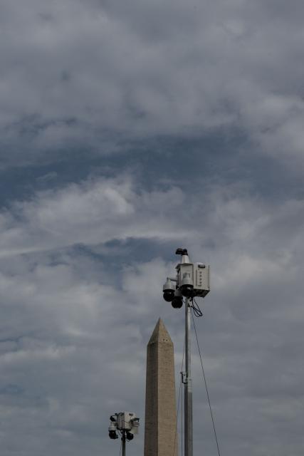 Multiple mobile surveillance trailers are seen near the Washington Monument along the National Mall in Washington, DC on July 24, 2026. (Photo by Kent Nishimura / AFP)