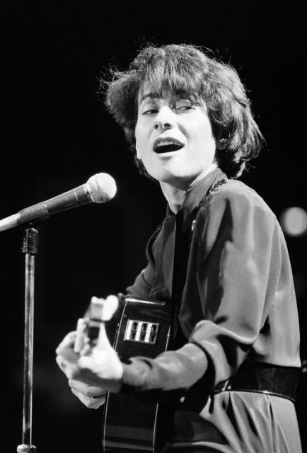 (FILES) French singer Marie Paule Belle performs for the International Women's Day at the Zenith hall in Paris on March 8, 1984. French singer, composer and pianist Marie Paule Belle, best known for "La Parisienne," a hit in the French music in the 1970s, died on July 25, 2026 at the age of 80, her press agent announced to AFP. (Photo by Joel ROBINE / AFP)