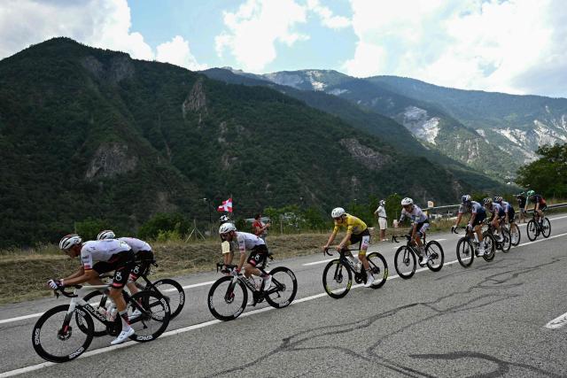 UAE Team Emirates - XRG's Slovenian rider Tadej Pogacar wearing the overall leader's yellow jersey cycles during the 20th stage of the 113th edition of the Tour de France cycling race, 170,9 km between Le Bourg-d'Oisans and Alpe d'Huez in the French Alps, on July 25, 2026. (Photo by Loic VENANCE / AFP)