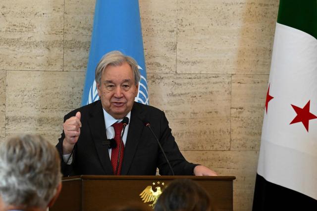 UN Secretary-General Antonio Guterres speaks as Syria's Foreign Affairs Minister (unseen) listen on during a joint press conference following their meeting at the Tishreen Palace in the Syrian capital Damascus on July 25, 2026. United Nations Secretary-General Antonio Guterres urged international support for Syria on July 25, as he visited the country, which is in transition following years of war and the overthrow of longtime ruler Bashar al-Assad. Guterres is the first UN chief to visit Syria since his predecessor Ban Ki-moon in 2009, two years before the start of Syria's civil war which went on to kill more than half a million people before the new Islamist authorities took power in December 2024. (Photo by LOUAI BESHARA / AFP)
