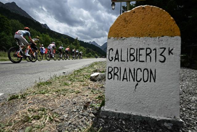 The lead breakaway cycles in the Col du Galibier ascent during the 20th stage of the 113th edition of the Tour de France cycling race, 170,9 km between Le Bourg-d'Oisans and Alpe d'Huez in the French Alps, on July 25, 2026. (Photo by Loic VENANCE / AFP)