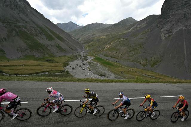 EF Education - EasyPost team's Irish rider Ben Healy (L) and EF Education - EasyPost team's Ecuadorian rider Richard Carapaz wearing the climber's dotted "King of the Mountains" jersey lead a breakaway in the Col du Galibier ascent during the 20th stage of the 113th edition of the Tour de France cycling race, 170,9 km between Le Bourg-d'Oisans and Alpe d'Huez in the French Alps, on July 25, 2026. (Photo by Jeff PACHOUD / AFP)