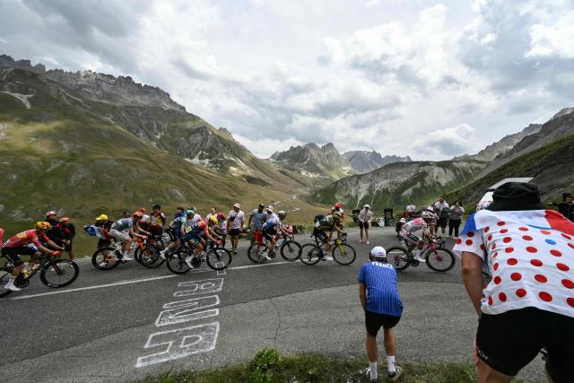 EF Education - EasyPost team's Ecuadorian rider Richard Carapaz wearing the climber's dotted "King of the Mountains" jersey leads a breakaway in the Col du Galibier ascent during the 20th stage of the 113th edition of the Tour de France cycling race, 170,9 km between Le Bourg-d'Oisans and Alpe d'Huez in the French Alps, on July 25, 2026. (Photo by Jeff PACHOUD / AFP)