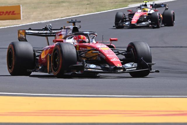 Ferrari's Monegasque driver Charles Leclerc (Front) and Ferrari's British driver Lewis Hamilton drive during the third practice session at the Hungaroring racetrack in Mogyorod near Budapest, Hungary, on July 25, 2026 ahead of the Formula One Hungarian Grand Prix. (Photo by Attila KISBENEDEK / AFP)