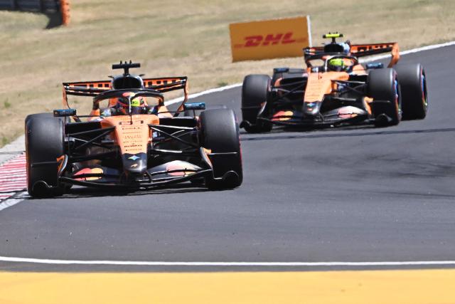 McLaren's Australian driver Oscar Piastri (Front) and McLaren's British driver Lando Norris drive during the third practice session at the Hungaroring racetrack in Mogyorod near Budapest, Hungary, on July 25, 2026 ahead of the Formula One Hungarian Grand Prix. (Photo by Attila KISBENEDEK / AFP)