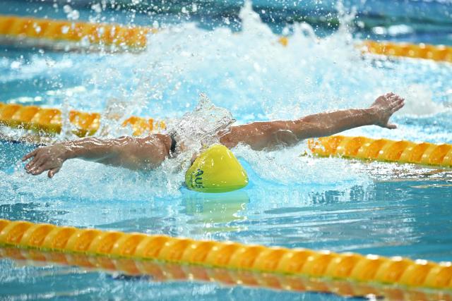 Australia's Alex Perkins wins the Women's 50m Butterfly Final during the swimming event at the Tollcross International Swimming Centre in Glasgow, on day two of the Commonwealth Games in Glasgow, Scotland, on July 25, 2026. (Photo by Oli SCARFF / AFP)