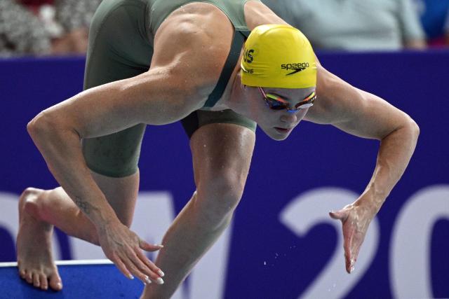 Australia's Alex Perkins wins the Women's 50m Butterfly Final during the swimming event at the Tollcross International Swimming Centre in Glasgow, on day two of the Commonwealth Games in Glasgow, Scotland, on July 25, 2026. (Photo by Oli SCARFF / AFP)