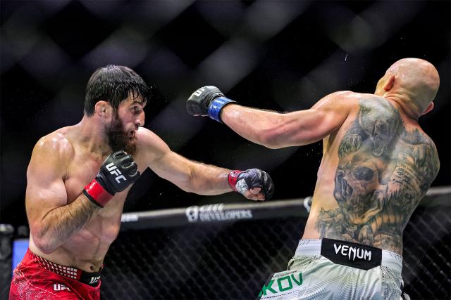 Russia's Magomed Ankalaev and Uzbekistan's Bogdan Guskov compete in their men's light heavyweight fight in the UFC Fight Night event at Etihad Arena in Abu Dhabi on July 25, 2026. (Photo by Fadel SENNA / AFP)