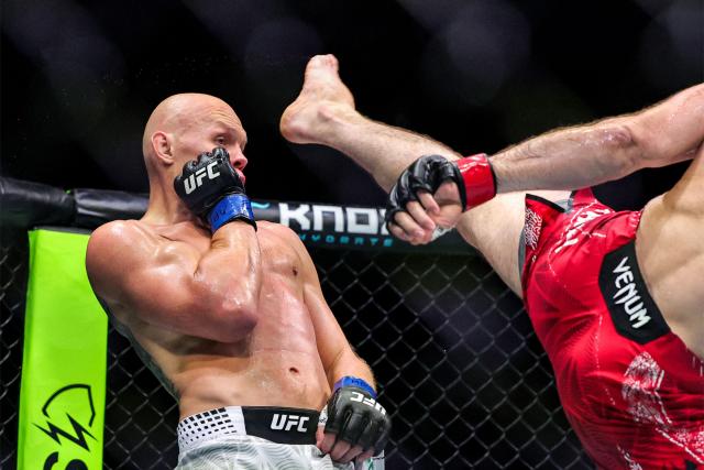 Russia's Magomed Ankalaev and Uzbekistan's Bogdan Guskov compete in their men's light heavyweight fight in the UFC Fight Night event at Etihad Arena in Abu Dhabi on July 25, 2026. (Photo by Fadel SENNA / AFP)