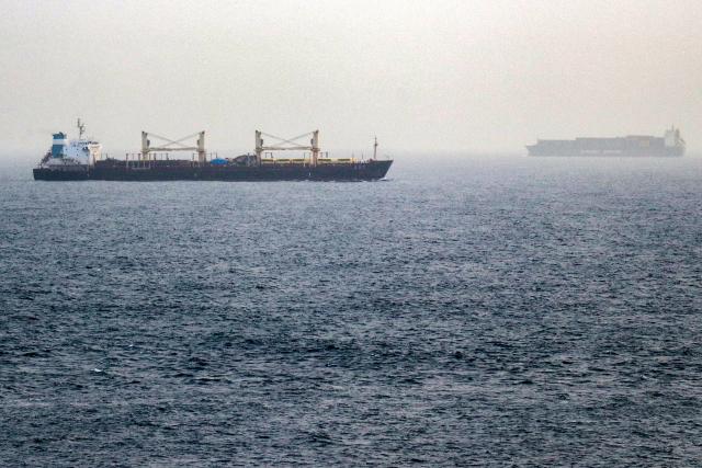 Vessels transit the Bab el-Mandeb Strait off the coast of southern Yemen on July 25, 2026. A spokesman for Yemen's Houthis had said on July 24 that the rebels were not blocking traffic through the strategic Bab al-Mandeb Strait, after they declared a maritime embargo this week on their foe Saudi Arabia. The Iran-backed group attacked a Saudi ship in the nearby Red Sea after announcing the blockade, which threatens the top oil exporter's ability to get its supplies to the world following Iran's parallel blockade of the Strait of Hormuz, the kingdom's only other maritime route. (Photo by Khaled ZIAD / AFP) / 