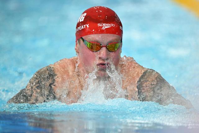 Englands's Adam Ramsay-Peaty competes in the Men's 100m Breaststroke Final during the swimming event at the Tollcross International Swimming Centre in Glasgow, on day two of the Commonwealth Games in Glasgow, Scotland, on July 25, 2026. (Photo by Oli SCARFF / AFP)