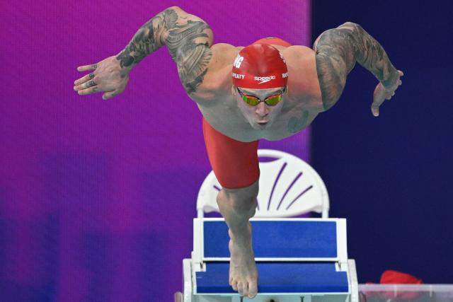 Englands's Adam Ramsay-Peaty competes in the Men's 100m Breaststroke Final during the swimming event at the Tollcross International Swimming Centre in Glasgow, on day two of the Commonwealth Games in Glasgow, Scotland, on July 25, 2026. (Photo by Oli SCARFF / AFP)