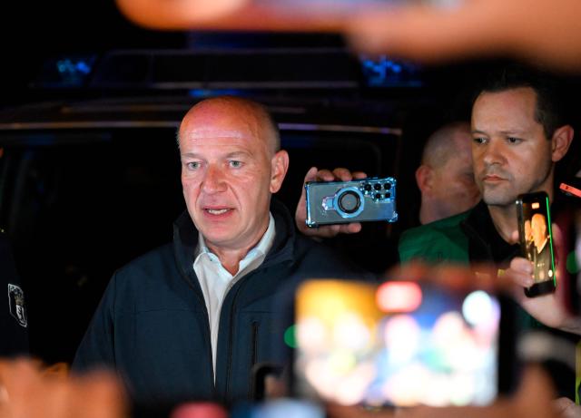 Berlin's mayor Kai Wegner speaks to the media near the scene where one person was killed and around 15 injured after a car is believed to have hit the crowd on the outskirts of the Christopher Street Day (CSD) parade in Berlin, on July 25, 2026. "We believe that a vehicle entered the Tiergarten park and hit several people and injured them," police posted on social media. The injured were being treated by the emergency services and they were actively seeking the people responsible, they added. (Photo by RALF HIRSCHBERGER / AFP)