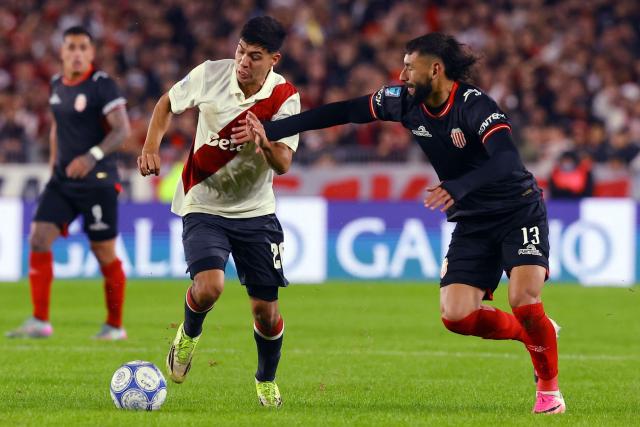 River Plate's midfielder #26 Tomas Galvan and Barracas Central's defender #13 Rafael Barrios fight for the ball during the Argentine Professional League 2026 Clausura football match between River Plate and Barracas Central at MAS Monumental Stadium in Buenos Aires on July 25, 2026. (Photo by Alejandro PAGNI / AFP)