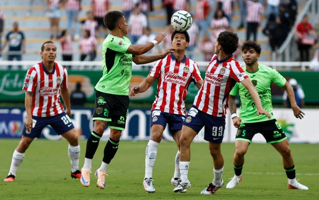 Guadalajara's defender #02 Jose Castillo heads the ball during the Liga MX Apertura football match between Guadalajara and Juarez at the Akron stadium in Zapopan, Jalisco, Mexico on July 25, 2026. (Photo by ULISES RUIZ / AFP)