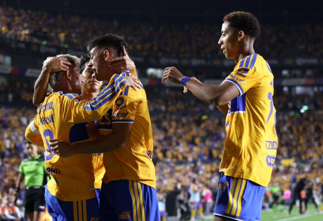 Tigres' Uruguayan midfielder #08 Fernando Gorriaran celebrates with teammates after scoring the opening goal during the Liga MX Apertura football match between Tigres and San Luis at the Universitario stadium in San Nicolas de los Garza, state of Nuevo Leon, Mexico on July 25, 2026. (Photo by Julio Cesar AGUILAR / AFP)