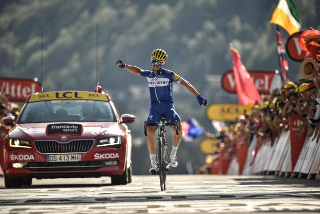 (FILES) France's Julian Alaphilippe celebrates as he crosses the finish line to win the tenth stage of the 105th edition of the Tour de France cycling race between Annecy and Le Grand-Bornand, French Alps, on July 17, 2018. “You shouldn’t expect to see me again”: French rider Julian Alaphilippe, double world champion and multiple-time wearer of the yellow jersey in the Tour de France, said on July 25, 2026, that he is unlikely to return to the race after the penultimate stage of this 113th edition. (Photo by Marco BERTORELLO / AFP)