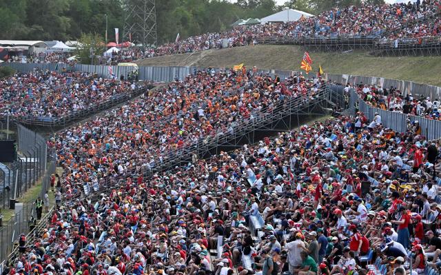 Fans sit on grandstands ahead of the Formula One Hungarian Grand Prix at the Hungaroring racetrack in Mogyorod near Budapest, Hungary, on July 26, 2026. (Photo by Attila KISBENEDEK / AFP)