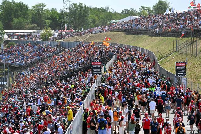 Fans arrive at the grandstands ahead of the Formula One Hungarian Grand Prix at the Hungaroring racetrack in Mogyorod near Budapest, Hungary, on July 26, 2026. (Photo by Attila KISBENEDEK / AFP)