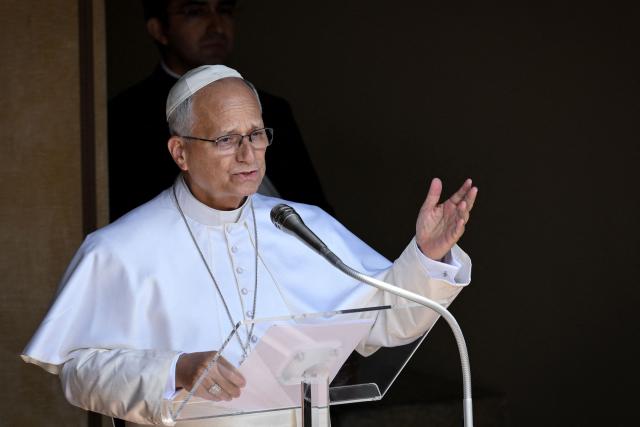 Pope Leo XIV leads the Angelus prayer from the entrance of the Apostolic Palace in Piazza della Liberta (Liberty Square) at the summer papal residence in Castel Gandolfo on July 26, 2026. (Photo by TIZIANA FABI / AFP)