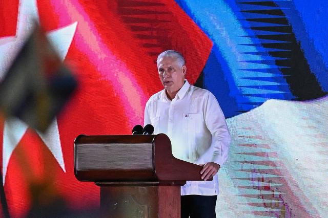 Cuba's President Miguel Díaz-Canel delivers a speech during the 73rd anniversary celebration of the guerrilla assault on the Moncada Barracks, led by the late leader Fidel Castro and considered the start of the Cuban Revolution, in Pinar del Rio, Cuba, on July 26, 2026. (Photo by YAMIL LAGE / AFP)