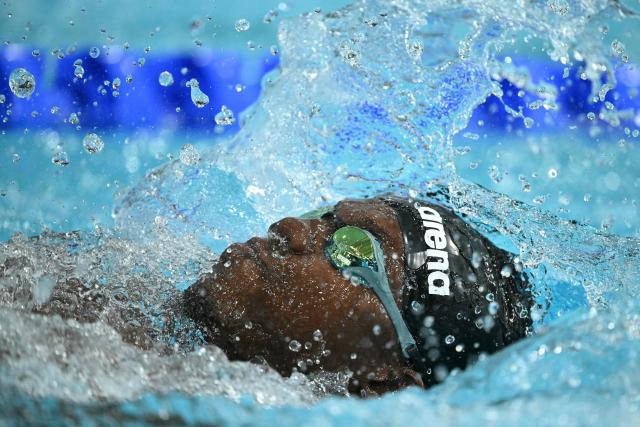 barbados' Antwahn Boyce-Vaughan competes in the Men's S9 100m Backstroke Final during the swimming event at the Tollcross International Swimming Centre in Glasgow, on day three of the Commonwealth Games in Glasgow, Scotland, on July 26, 2026. (Photo by Oli SCARFF / AFP)