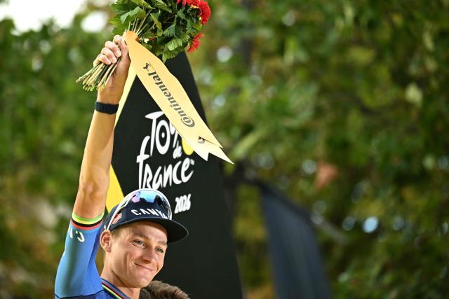 Alpecin - Premier Tech team's Dutch rider Mathieu van der Poel celebrates on the podium after winning the 21st stage of the 113th edition of the Tour de France cycling race, 88,7 km starting and finishing in Paris, on July 26, 2026. (Photo by Loic VENANCE / AFP)