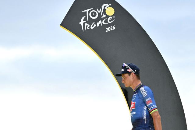 Alpecin - Premier Tech team's Dutch rider Mathieu van der Poel celebrates on the podium after winning the 21st stage of the 113th edition of the Tour de France cycling race, 88,7 km starting and finishing in Paris, on July 26, 2026. (Photo by Jeff PACHOUD / AFP)