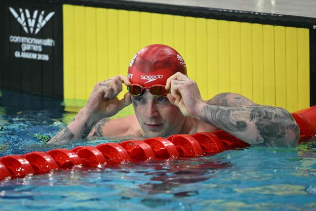 England's Adam Ramsay-Peaty reacts after the Men's 50m Breaststroke Semi-Final during the swimming event at the Tollcross International Swimming Centre in Glasgow, on day three of the Commonwealth Games in Glasgow, Scotland, on July 26, 2026. (Photo by Oli SCARFF / AFP)
