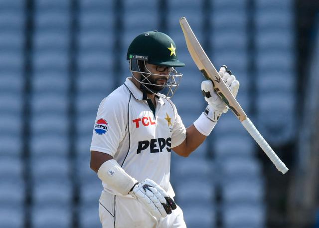 Imam-Ul-Haq of Pakistan celebrates his half century during the 2nd day of 1st Test match between West Indies and Pakistan at Brian Lara Cricket Academy in Tarouba, Trinidad and Tobago on July 26, 2026. (Photo by Randy Brooks / AFP)
