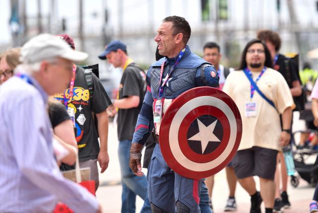 A Captain America cosplayer walks outside the convention center during Comic-Con International in San Diego, California, on July 26, 2026. (Photo by Chris DELMAS / AFP)