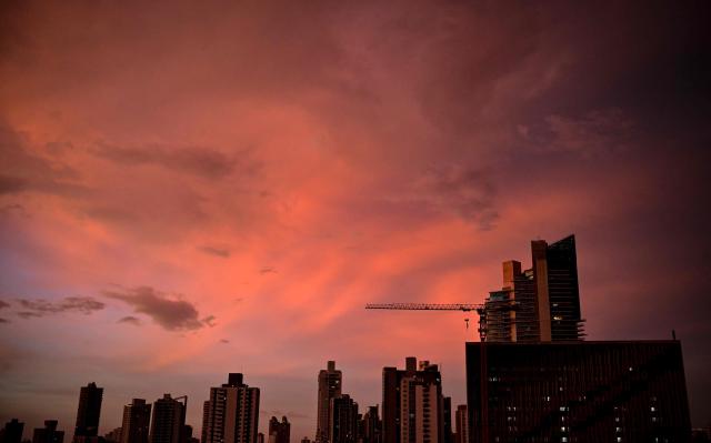 The sunset is pictured in Panama City on July 26, 2026. (Photo by MARTIN BERNETTI / AFP)