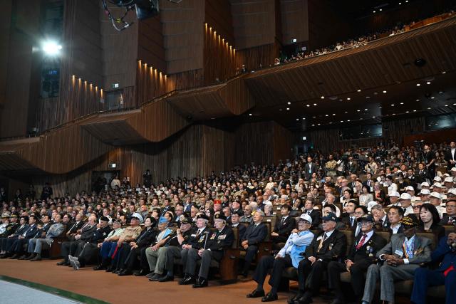 United Nations veterans of the Korean War attend a national ceremony for the Korean War UN Veterans Day in Seoul on July 27, 2026. (Photo by GREG BAKER / AFP)