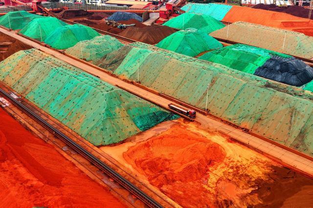 Imported iron ore is seen at the ore terminal of Qingdao Port in Shandong province, eastern China, on July 27, 2026. (Photo by CN-STR / AFP) / China OUT