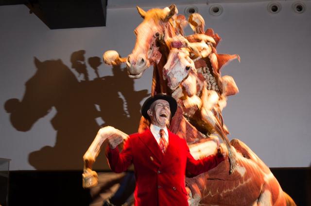 (FILES) In this file photo taken on October 4, 2018 German anatomist and inventor of the plastination technique Gunther von Hagens poses in front an artwork entitled 'Rider' during a photo call at the opening of the Body Worlds Museum in London. Gunther von Hagens, the physician and inventor of plastination, has died. His family and the Institute for Plastination announced in Heidelberg on July 27, 2026 that he passed away on July 24, 2026 at the age of 81. Von Hagens was the creator of the 'Body Worlds' exhibitions, which display human anatomy using the plastinated bodies of the deceased. (Photo by Daniel LEAL / AFP)